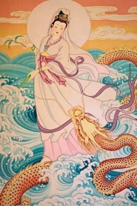 Guanyin nell'atto di  cavalcare un drago